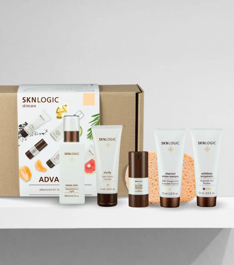 SKNLogic - Advance Kit - Clearer Skin Kit (Eye Revitalize, Clarify, Charcoal Detox MasqueExfoliate Enzymatic, Renew Mist, and FREE Gauze & Facial Sponges)