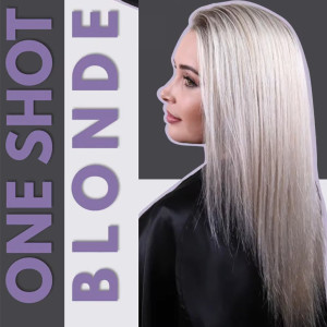 Side profile of a woman with long platinum-blonde straight hair against a gray background, promoting a blonde hair look.